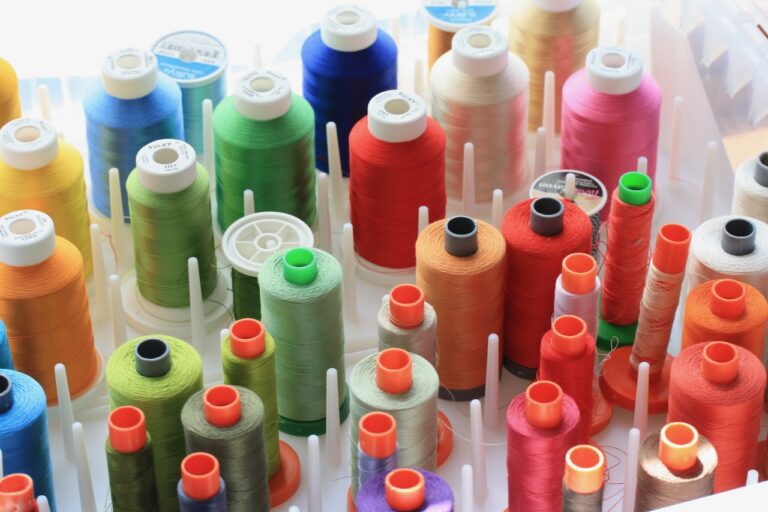 Different colored spools of thread